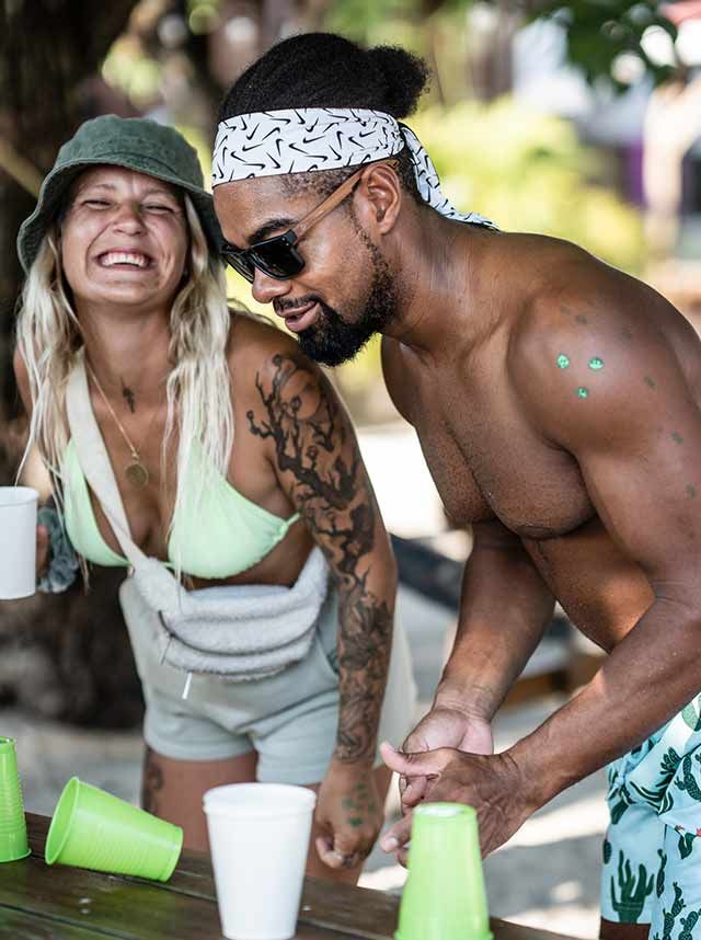 Man and woman having fun at Trudy's Hotel in Honduras, Utila.