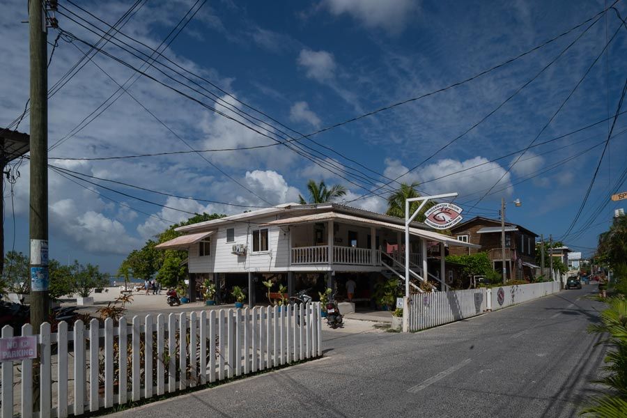 Underwater Vision is a Utila dive center located in Honduras, the image shows the street and the building with the sign.